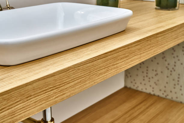istock Floating wooden basin countertops in luxury bathroom 1269786237