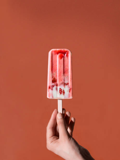 istock young woman holding an ice cream 1269790097