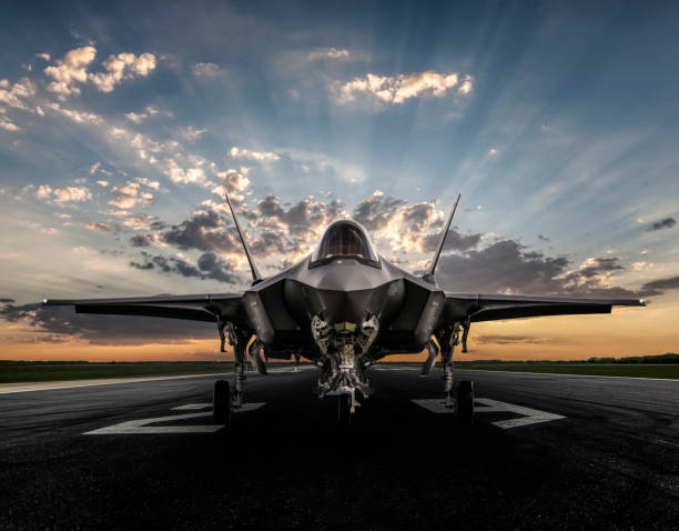 F-35 jet fighter on runway to take off F-35 jet fighter on runway to take off fighter plane stock pictures, royalty-free photos & images