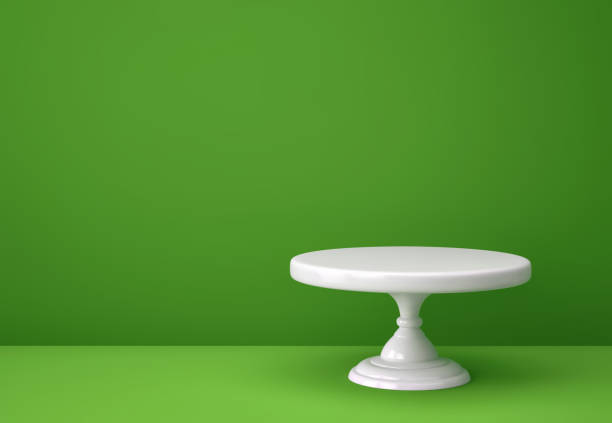 istock Porcelain cake stand on green backgroung 1269793558