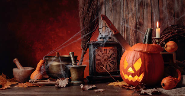 istock Halloween pumpkins on an old wooden background. 1269797699