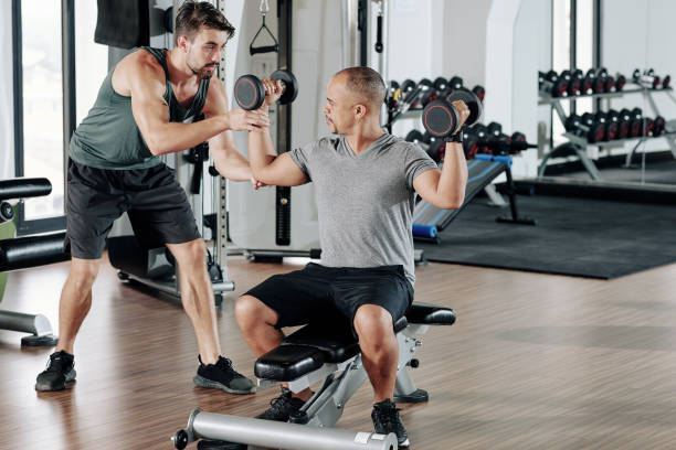 istock Exercising with fitness coach 1269798599