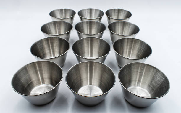 istock Steel molds for cupcakes and muffins, isolated on white background 1269798714