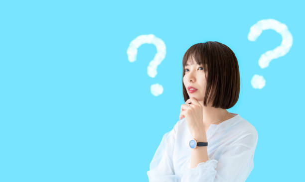 istock Young asian woman having questions. 1269799233