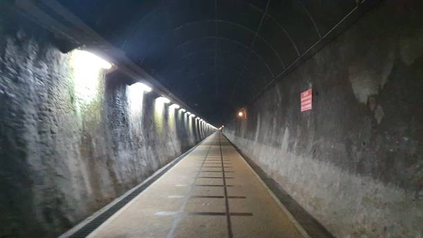 Long dark tunnel stock photo