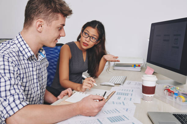 istock Emotional conversation of UI designers 1269801278