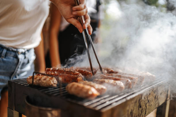 istock Two female friends enjoying barbecue party 1269802521
