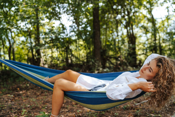 istock Girl relaxing in hammock 1269804311