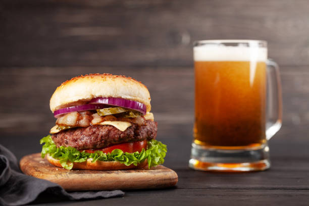 istock Homemade tasty beef burger and beer 1269806353