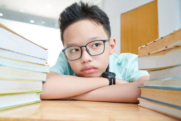 Pensive preteen boy