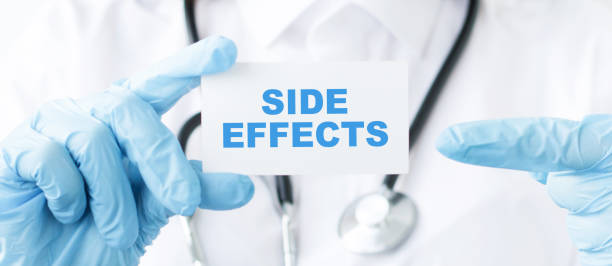 istock Doctor holding a card with text Side effects medical concept 1269812138