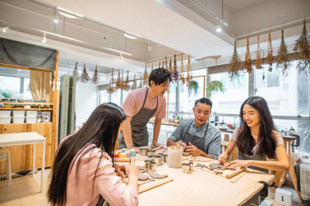 istock Chinese Corporate Professionals Learning New Creative Skills 1269813333