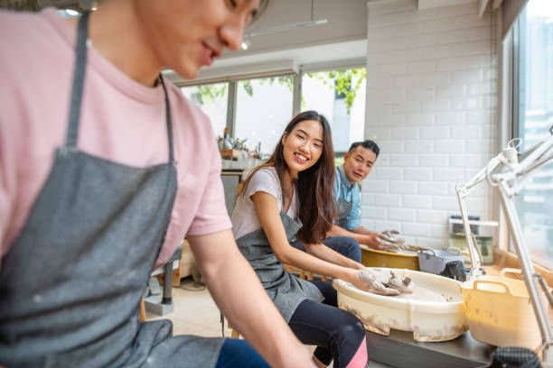 istock Hong Kong Craftspeople Working at Pottery Wheels 1269813340