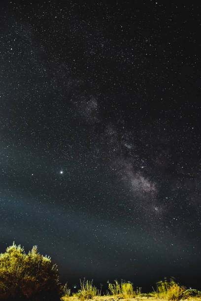 istock Milky way in summer in Formentera with beacon lights 1269815868