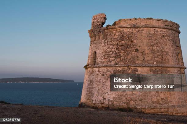 Torre Del Cap De Barbaria In The Distance Far Del Cap De Barbaria Stock Photo - Download Image Now