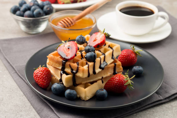 istock Belgian waffles for breakfast. Dessert food concept. 1269819449