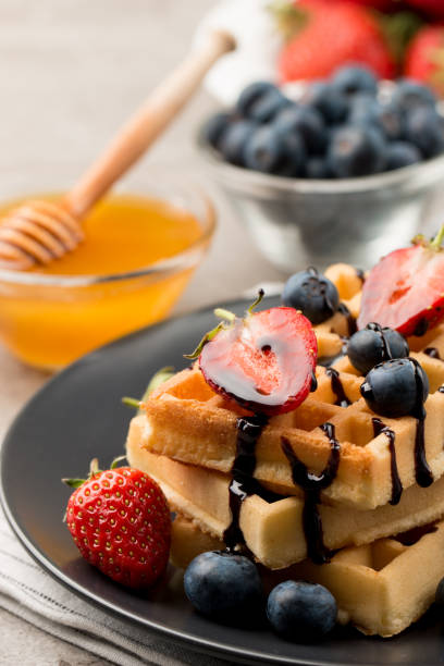 istock Belgian waffles for breakfast. Dessert food concept. 1269819465