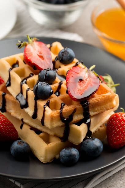 istock Belgian waffles for breakfast. Dessert food concept. 1269819502