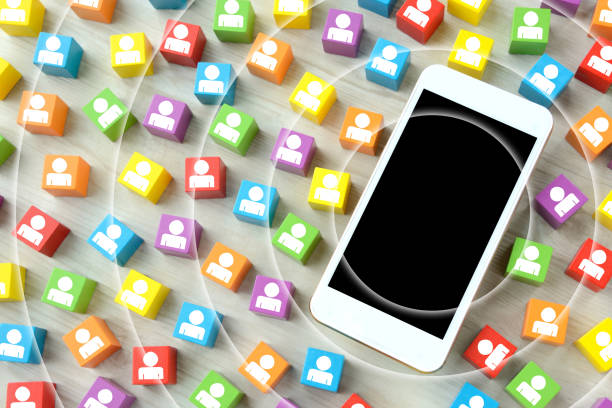 istock Smart phone and colorful blocks with human pictogram 1269819722