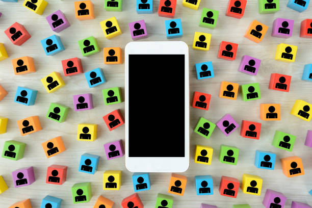 istock Smart phone and colorful blocks with human pictogram 1269819741