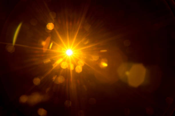 istock Abstract Natural Sun flare on the black 1269825529