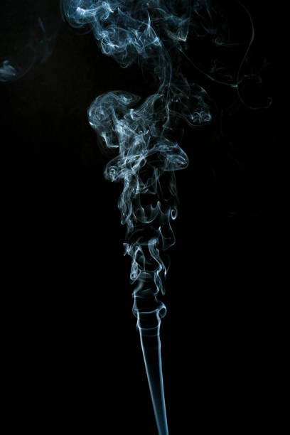 istock smoke cloud with black background. fog texture 1269826159
