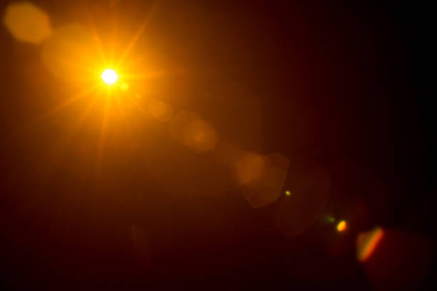 istock Abstract Natural Sun flare on the black 1269826204
