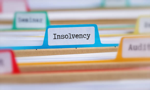 istock File folders with a tab labeled Insolvency 1269830801