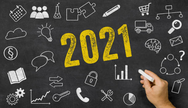 istock 2021 written on a blackboard with icons 1269830825