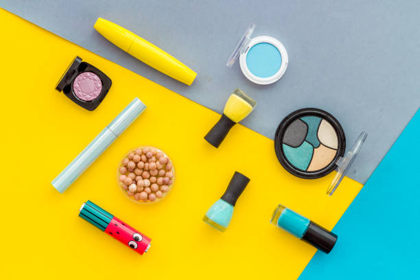 istock Flat lay of decorative cosmetics on color background. Above view 1269832811