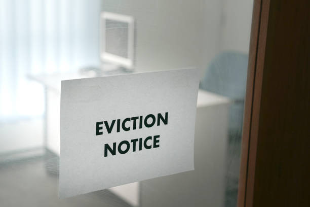 istock Eviction Notice on office glass door. 1269836913