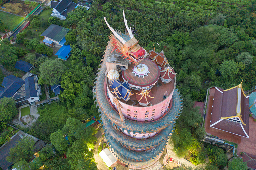 Aerial view of Wat Samphran or Chinese Dragon Temple in Sam Phran District in Nakhon Pathom province near Bangkok Urban City, Thailand. Tourist attraction landmark in travel trip concept.