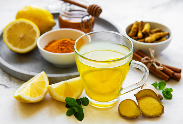 istock Energy tonic drink with turmeric, ginger, lemon and honey 1269840019