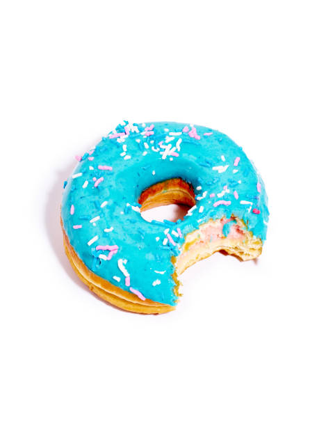istock Sweet blue glazed donut bitten from one side 1269840479