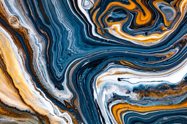 istock Fluid art texture. Background with abstract mixing paint effect. Liquid acrylic picture that flows and splashes. Mixed paints for posters or wallpapers. White, blue and golden overflowing colors. 1269847421