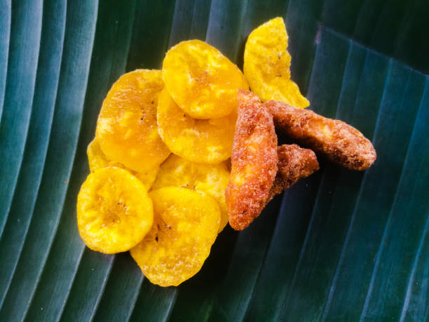 istock Banana chips with jaggery coated banana chips on a banana leaf. 1269851537