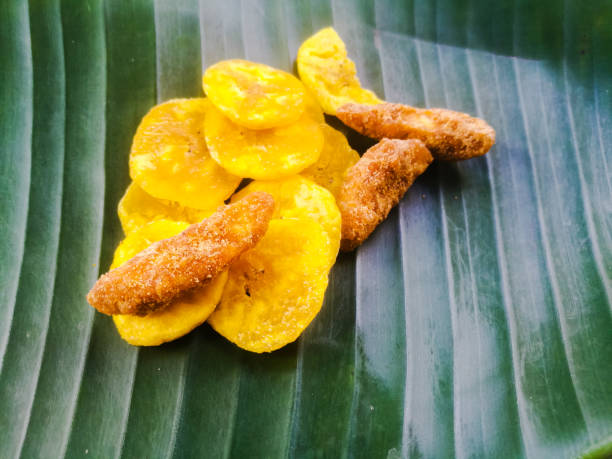 istock Banana chips with jaggery coated banana chips on a banana leaf. 1269851563