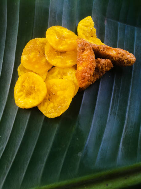 istock Banana chips with jaggery coated banana chips on a banana leaf. 1269851580