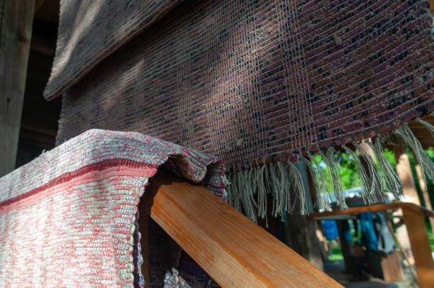 istock fabric rugs hang on wooden railings 1269854190