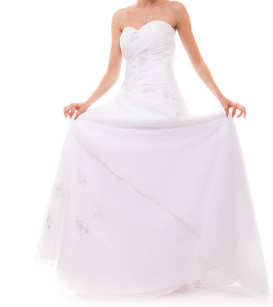 istock Full length bride in white wedding gown isolated 1269855289
