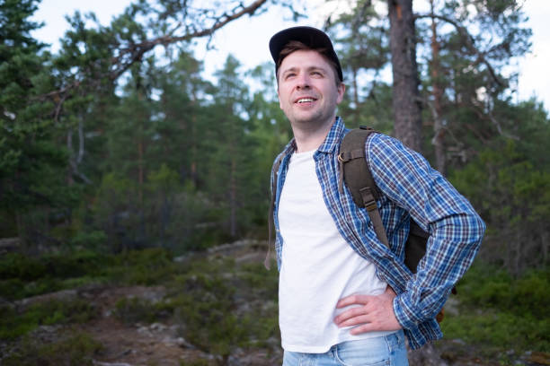 istock Mature caucasian man smiling walking at the park 1269856691