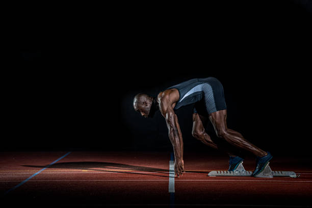 istock African-American sprinter about to start 1269858256