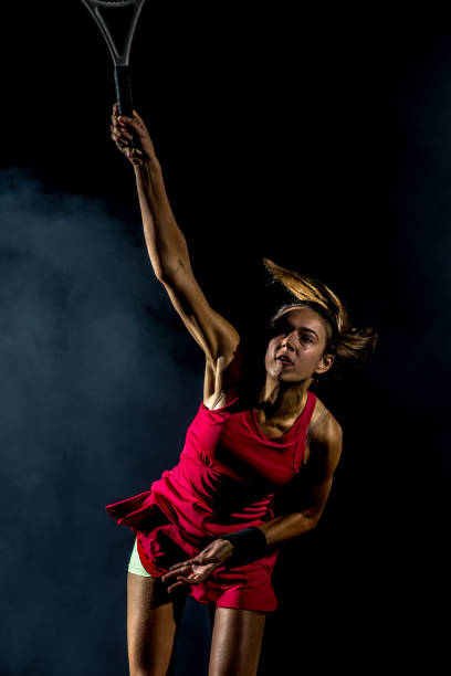 istock Caucasian female tennis player serving 1269858316