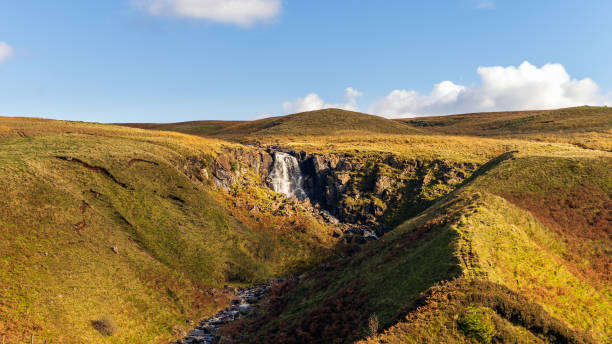Beautiful waterfall and stream in the valley of Glenariff Forest Park Beautiful waterfall and stream in the valley of Glenariff Forest Park in autumn colours, Count Antrim, Northern Ireland glenariff photos stock pictures, royalty-free photos & images