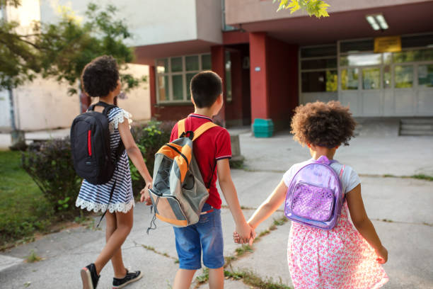 istock Beautiful school children active and happy 1269861356