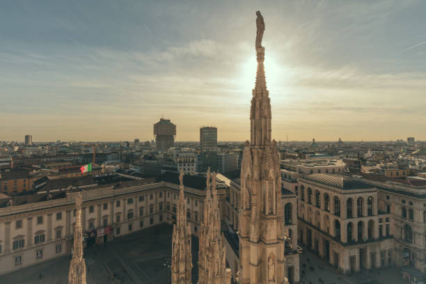 Milan old town square at sunset seen from Milan Cathedral Panoramic view from Milan Cathedral, Lombardy, Italy. lombardy photos stock pictures, royalty-free photos & images