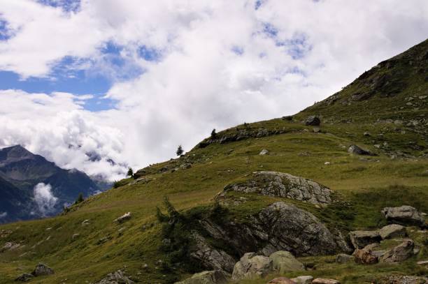 istock Cloudscape in the Alps with mountains in background (Peio, Trentino, Italy, Europe) 1269864201