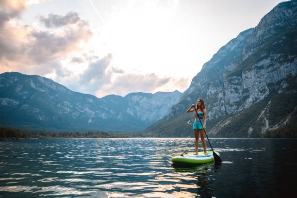 istock Woman on Paddleboard Enjoying Solitude and Beauty in Nature 1269865204