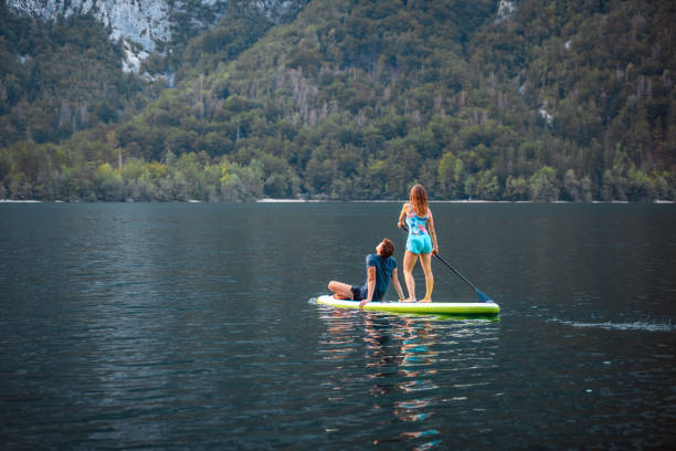 istock Vacationing Couple Paddleboarding on Lake Bohinj 1269865214