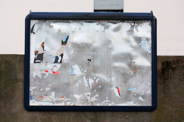 istock Old damaged grunged billboard at wall 1269866292
